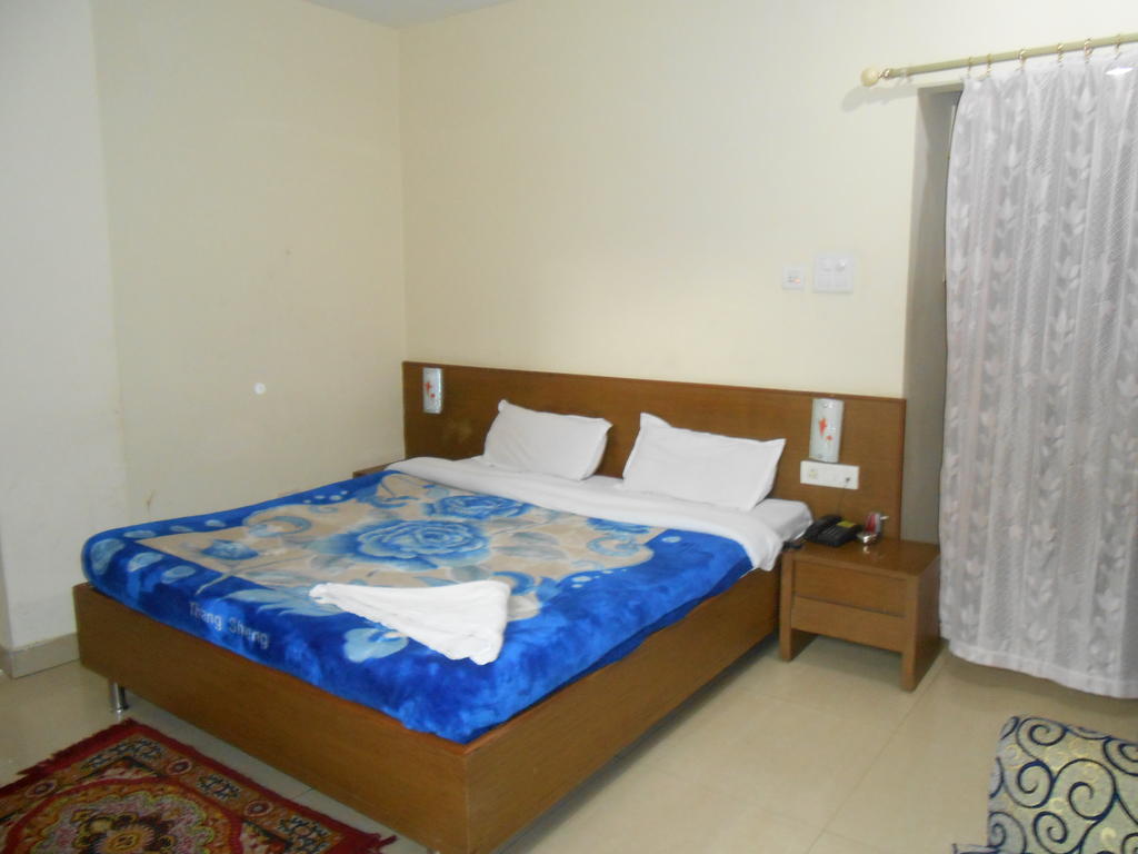 Hotel Fame City Guwahati Quarto foto