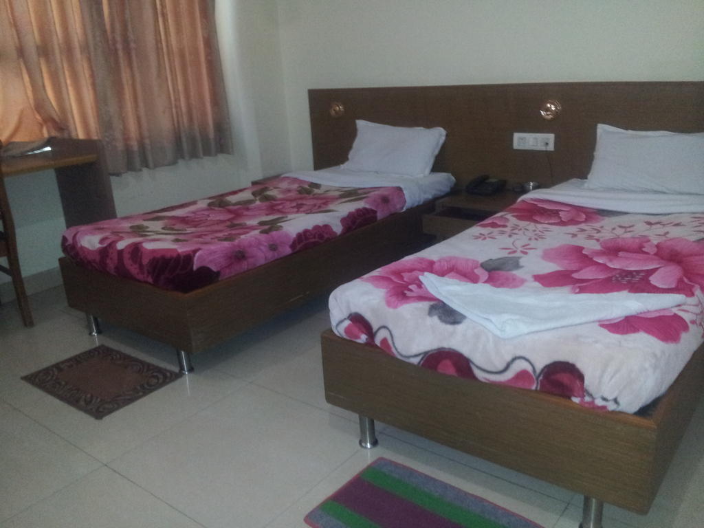 Hotel Fame City Guwahati Quarto foto